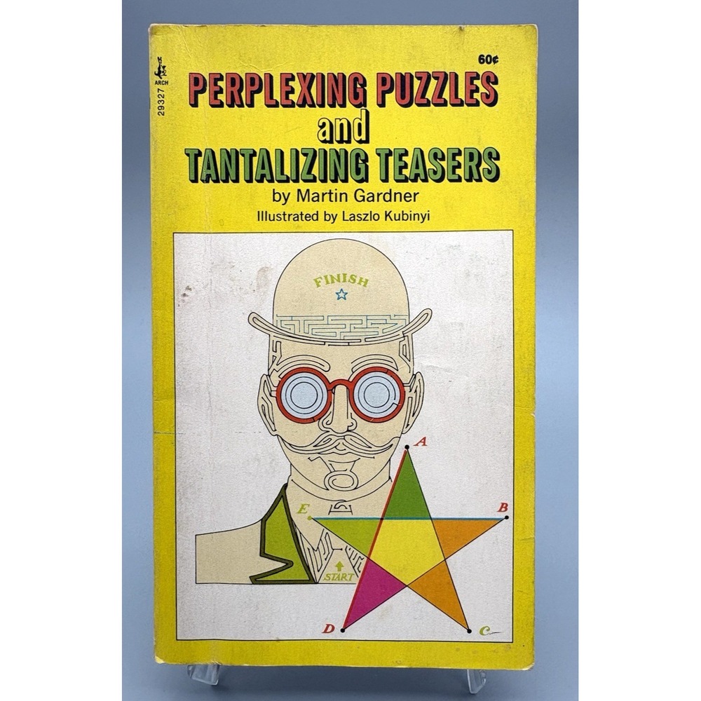Vintage paperback book Perplexing Puzzles & Tantalizing Teasers 1971 unused